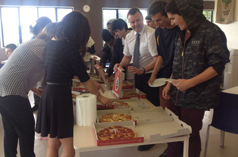 Academy New Zealand students dive into their Pizza reward