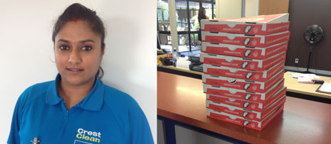 Pictured Left is Franchisee Sharon Singh and Right, the stack of Pizza ready to be devoured