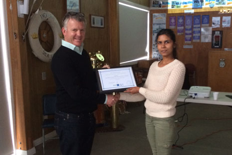 Wellington Franchisee Monita Devi-Chand receives her Five Year Long Service certificate from Managing Director Grant McLauchlan. 