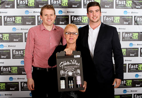 Sam Lewis, Wendy Carey, and Nick Dunne from CrestClean’s Dunedin office, accepting the Deloitte Fast 50 ‘Sustained Growth Award’ in the Otago and Lower South Island region.