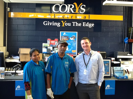 Franchisees Kamini and Ashveen Raju with Charles Bush, Branch Manager of Corys Electrical Silverdale.