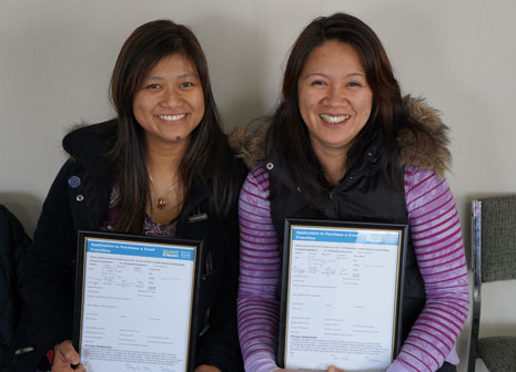 CrestClean’s Jackie Batoy and Julie Cacdac with New Franchisee applications already filled out and ready to go for when their new babies turn 18. 