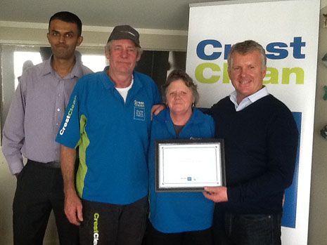 North Harbour Regional Director Neil Kumar (left) and CrestClean’s Managing Director Grant McLauchlan (right), congratulating Michael and Jean Dellow for their 7 Years Long Service.