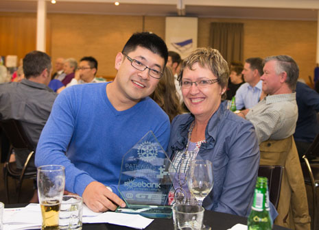 Leo Wang and Caroline Wedding celebrating his award.