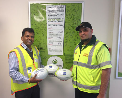 Regional Director for South and East Auckland, Viky Narayan, donating CrestClean rugby balls to Countdown’s Quiz Night charity fundraiser.