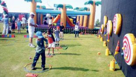 Kids enjoying the Snag Golf game, which Crest hired for the fundraising event. 