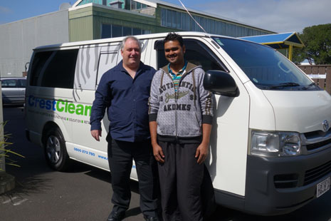 Auckland franchisee Prateesh showing off his newly signwritten Toyota Hiace with Regional Director Dries Mangnus. 