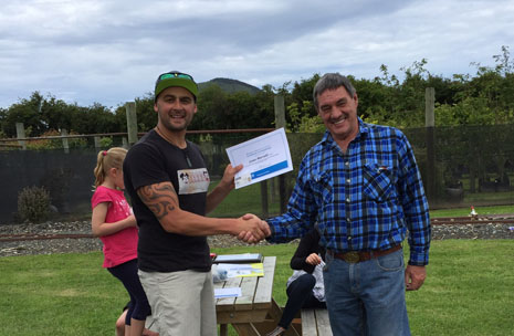 Dunedin franchisee Leon Harrald receiving a training certificate of completion from Regional Director Tony Kramers.