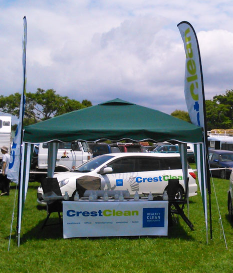 CrestClean’s information table at the Opotiki Rodeo was decorated with bright, visible flags and banners. 