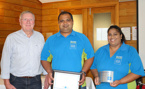 Davendran and Prithi Nairl receiving congratulations on 10 years with CrestClean from Marty Perkinson, Chairman of Directors.