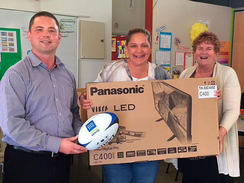 CrestClean National Sales Manager Chris Barker presented Freemans Bay School Principal Sandra Jenkins and Machelle Whaea with a 32” Panasonic TV and 9 LeslieRugby balls.