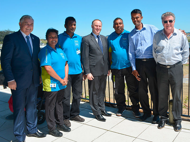 From left, Rodney MP Mark Mitchell, Radhna Mani, Naresh Mani, Rt Hon John Key, Rameshwar Sharma, North Harbour Regional Manager Neil Kumar and Master Cleaners Training Institute CEO Adam Hodge.