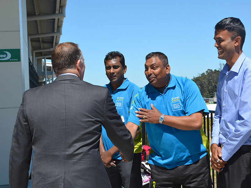 Naresh Mani, left, Rameshwar Sharma and Neil Kumar enjoying meeting Rt Hon John Key.