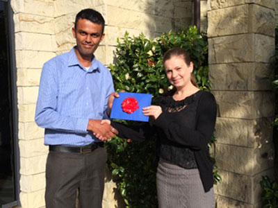 North Harbour/Whangarei Regional Manager Neil Kumar presented Nicki Pugh, from Centurion Management in Albany, with a SkyCity Hotel voucher she won in the prize draw at the North Harbour Business Association Business Expo.