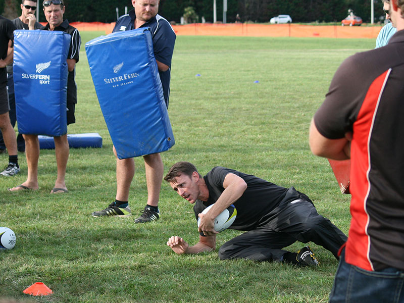 John Leslie shows kids and parents the correct way of carrying out skills and drills.