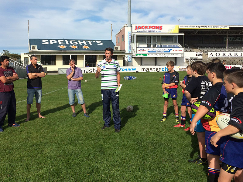 John Leslie talks through the junior rugby coaching content with players and coaches at Alpine Energy Stadium in Timaru.