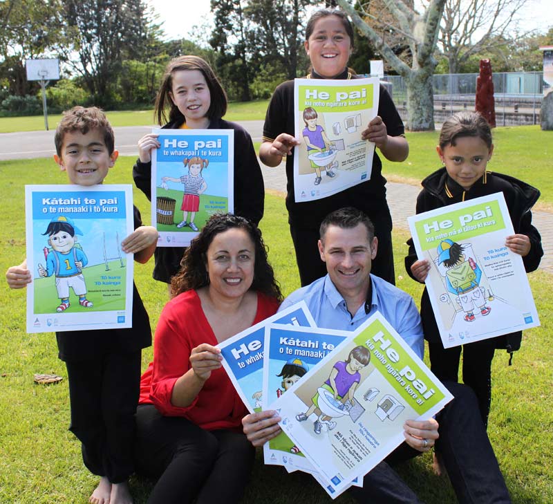 Tui Rolleston, Tumuaki at Te Kura o Matapihi School, receives poster packs from Jan Lichtwark, CrestClean’s Tauranga Regional Manager. With them are pupils Te Awanui Yeager, Charis Papuni, Te Ane Rose Williams and Carly Hall.   