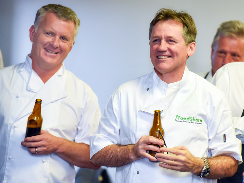 Time for a well-earned cold one as Grant McLauchlan and David Kirk relax after the cooking contest.