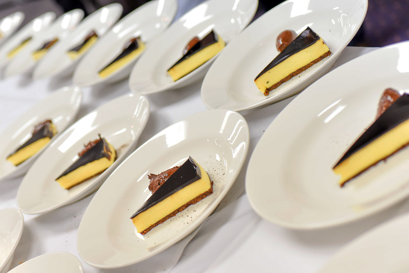 Tiramisu cheesecake beautifully presented for diners.