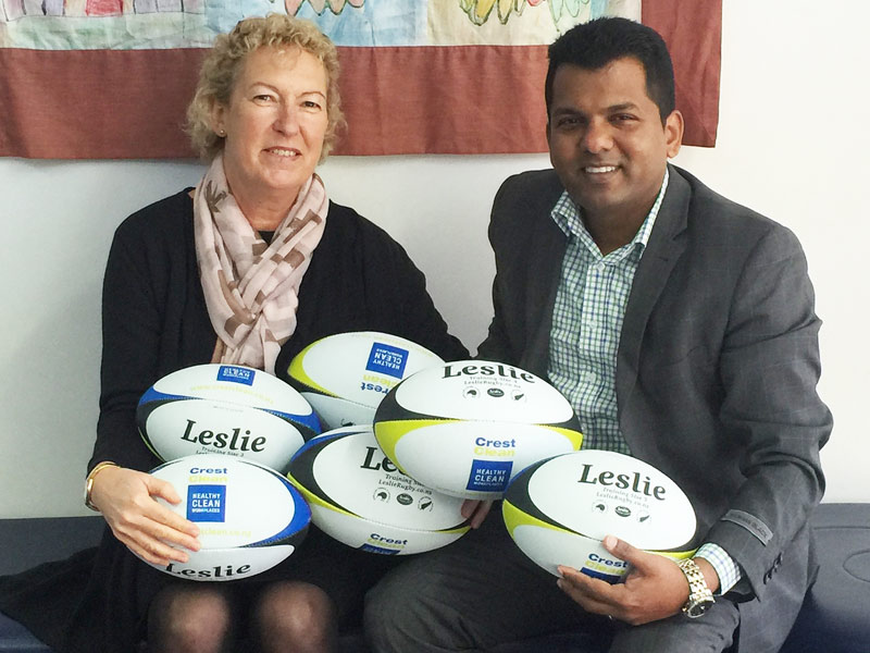 Karen McMurray, winner of the rugby balls during the NZPF annual conference, receives her prize from Crest’s Viky Narayan.