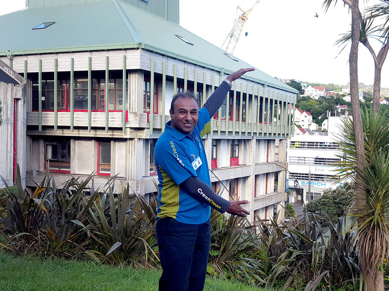 Asad Siddiqui shows the five levels of the school he and his wife clean each night.