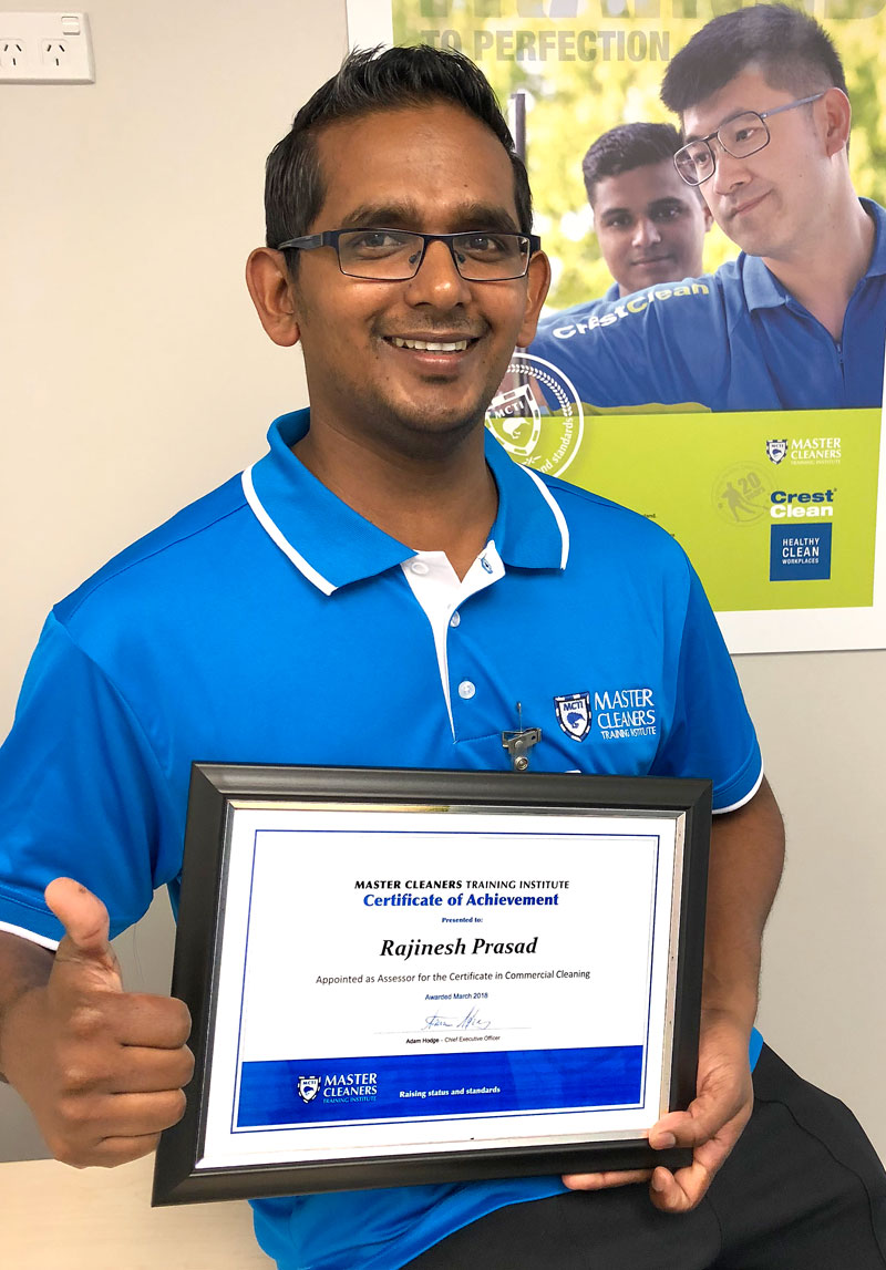 Rajinesh Prasad with his Master Cleaners Training Institute Certificate of Achievement.