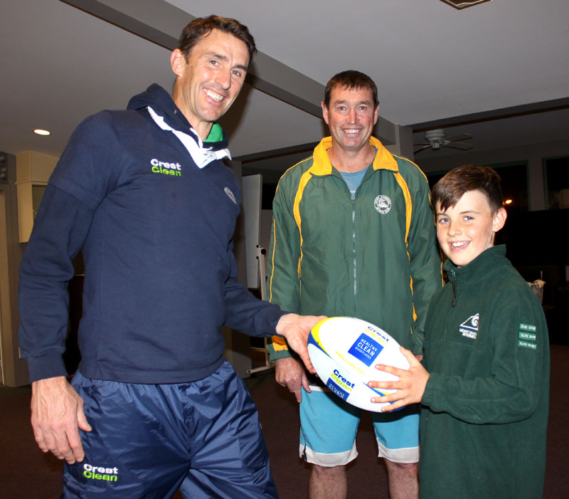 Under 12s team captain Gus Tustin gets a few tips from John Leslie. Looking on is Mike Williams, Mount Sports Junior Rugby chairman.