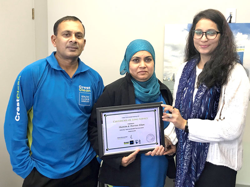 Shamim and Sharina Khan receive their long service award from Shareen Raj, CrestClean’s Palmerston North / Kapiti Coast Regional Manager. 