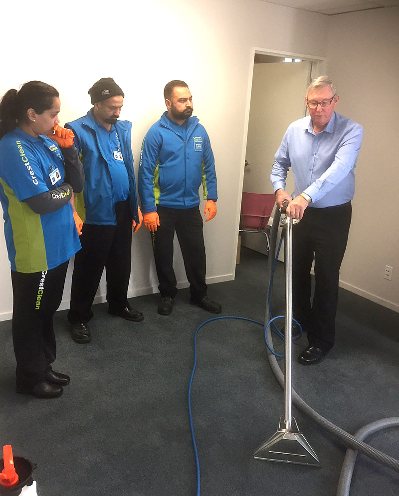 It’s all hands-on as instructor Charlie Lodge demonstrates cleaning techniques.