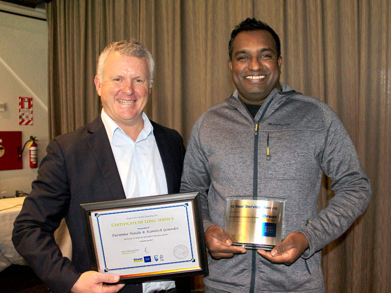 Kamlesh Gounder receives his Certificate of Long Service from Grant McLauchlan, CrestClean’s Managing Director.