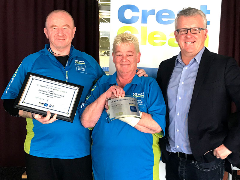 Alistair and Mary McCormick receive their Certificate of Long Service from CrestClean Managing Director Grant McLauchlan. 